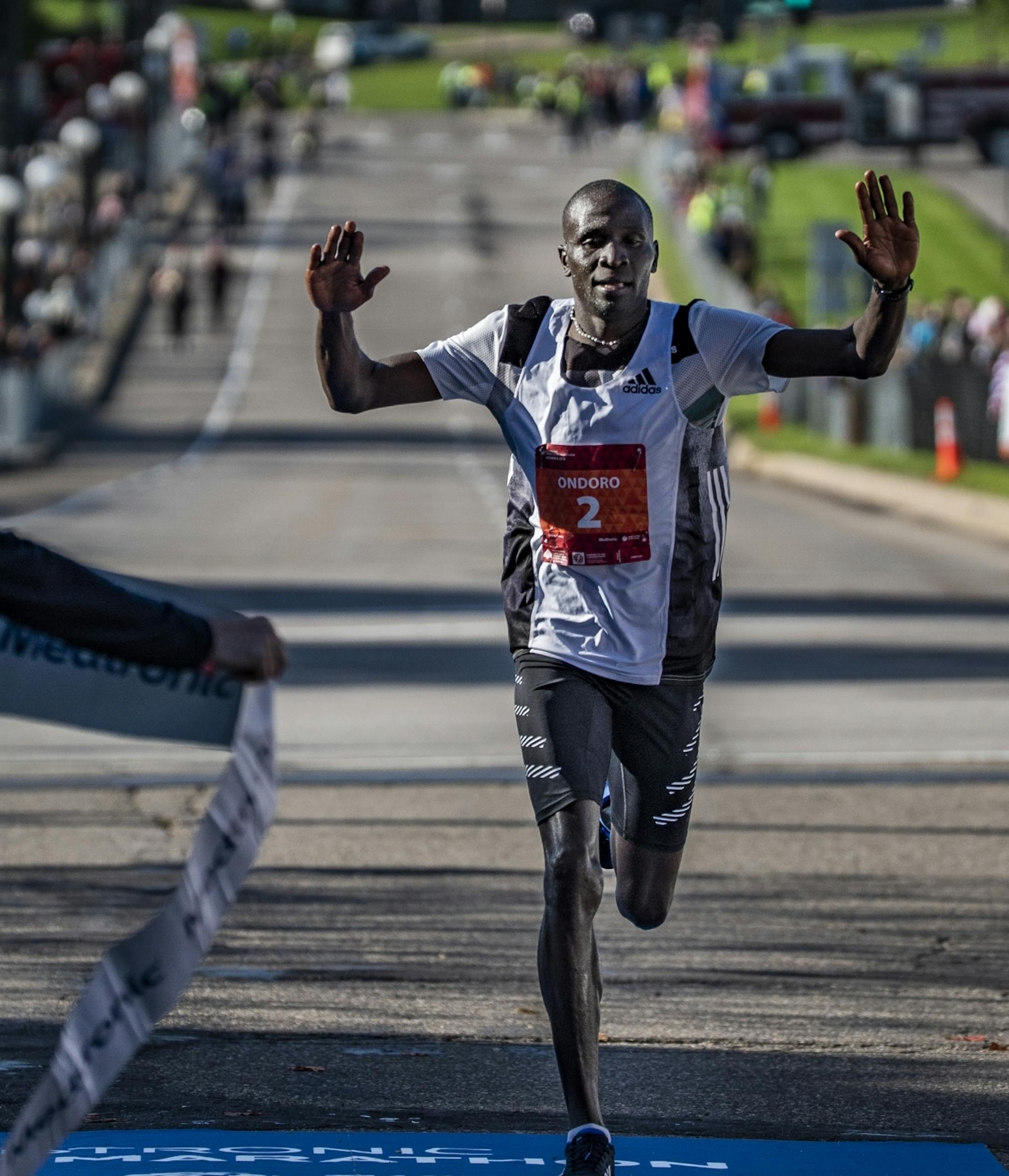 Dominic Ondoro finished in first place in the men's category for the Twin Cities Marathon in a time of 2:12:23.