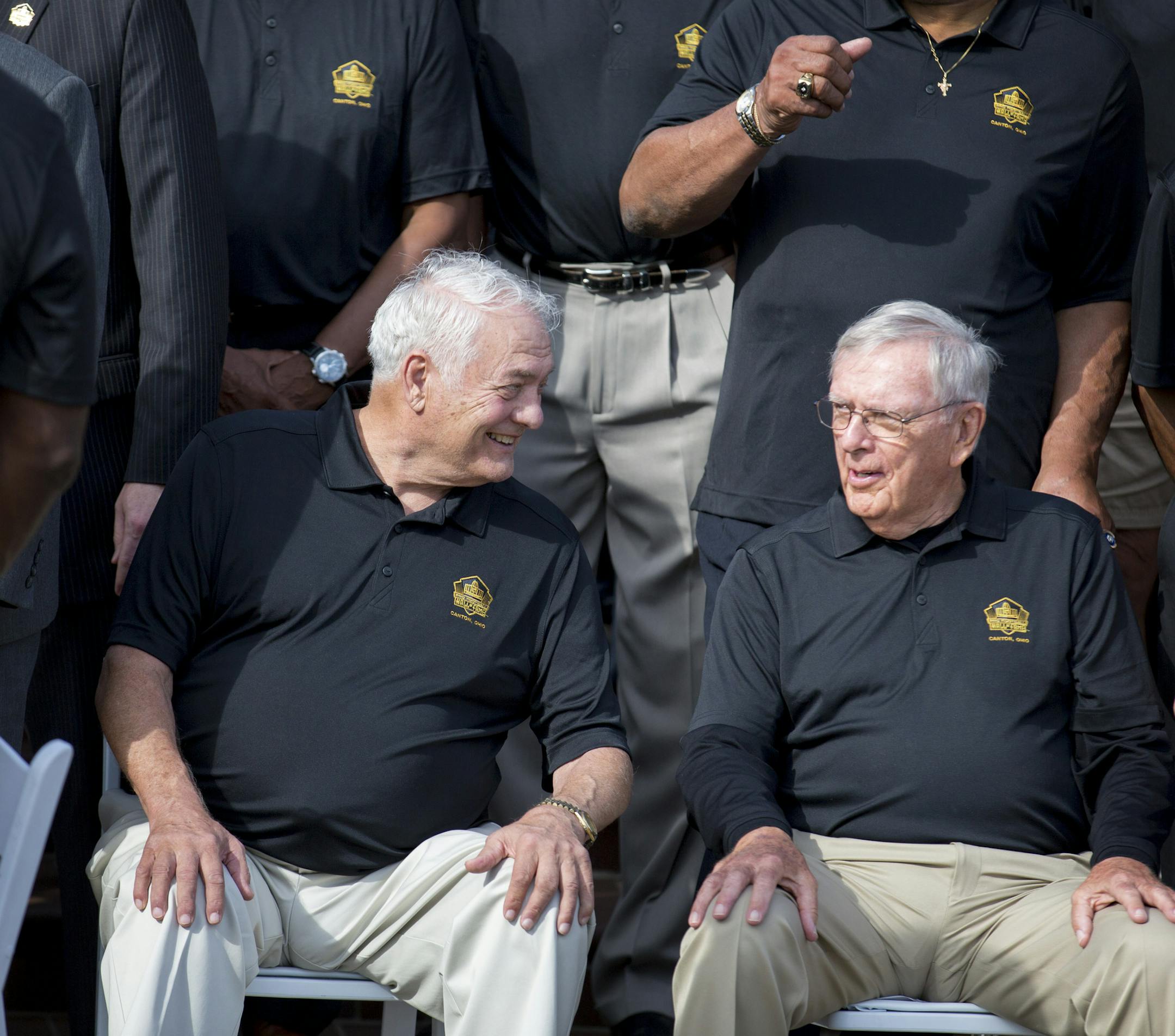 Minnesota Vikings Center Mick Tingelhoff will be inducted into the NFL Hall of Fame on Saturday and the festivities have already begun. Here, Mick Tingelhoff chats with fellow inductee Ron Wolf prior to a group photo Friday morning. ] Brian.Peterson@startribune.com Canton, OH - 8/7/2015