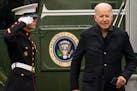 President Joe Biden arrives on Marine One on the South Lawn of the White House in Washington, Sunday, Nov. 21, 2021, as he returns from Wilmington, De