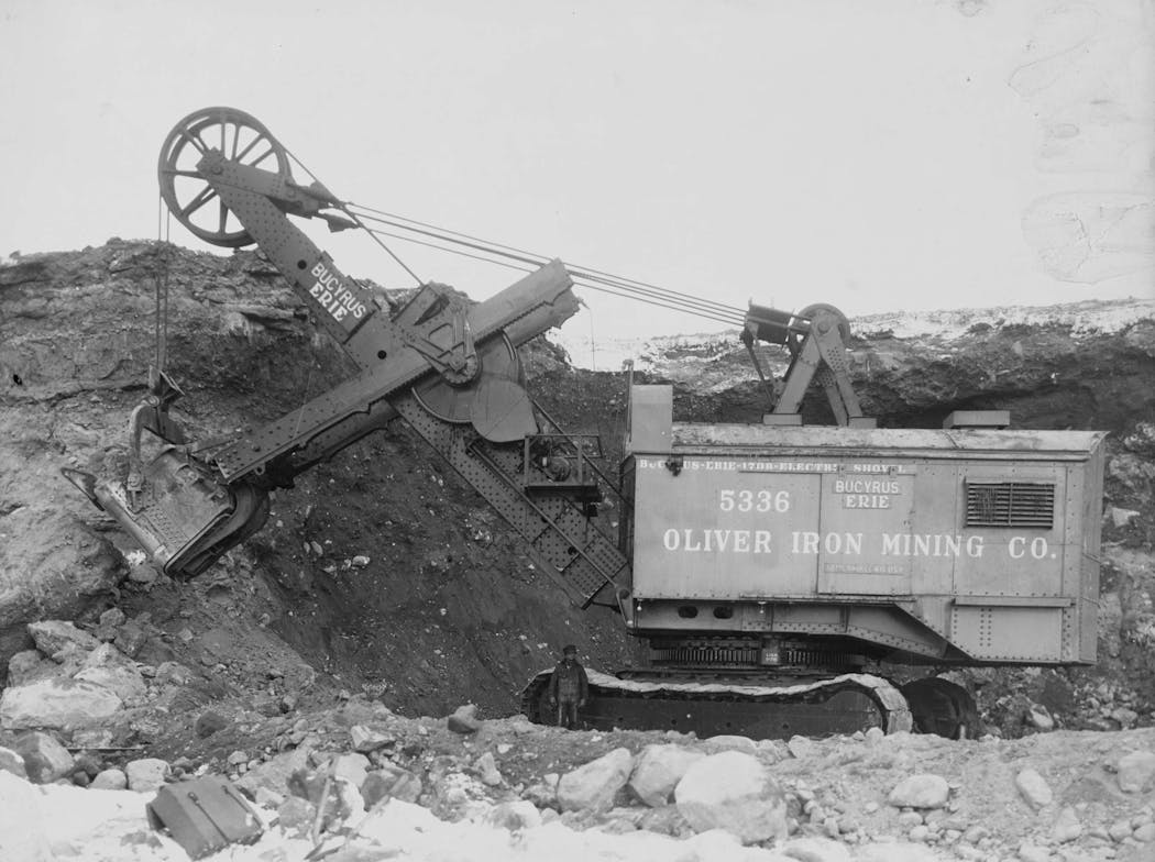 An electrical shovel owned by the Oliver Iron Mining Company gathered ore in a Mesabi Range mine, likely in the mid-1940s.
