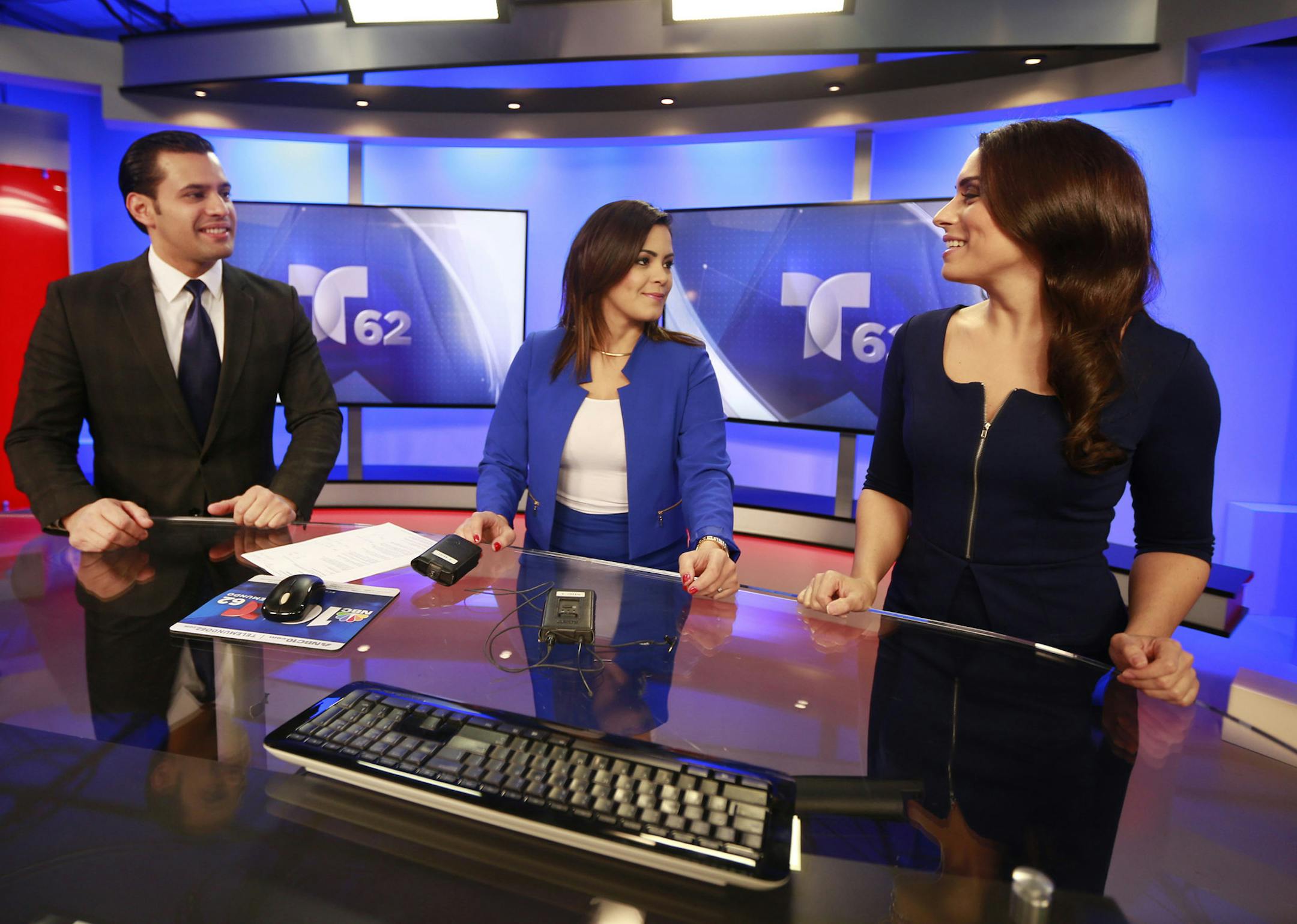 Sports anchor Jaime Becerril, reporter Iris Delgado, and weather anchor Violeta Yas, from left, on the set of Noticiero Telemundo62 on Dec. 10, 2015 in Philadelphia, Pa. (David Swanson/Philadelphia Inquirer/TNS) ORG XMIT: 1178664