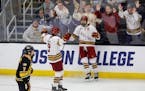 Boston College forward Ryan Leonard (9) celebrates with forward Cutter Gauthier after a goal against Michigan Tech in the first round of the NCAA tour