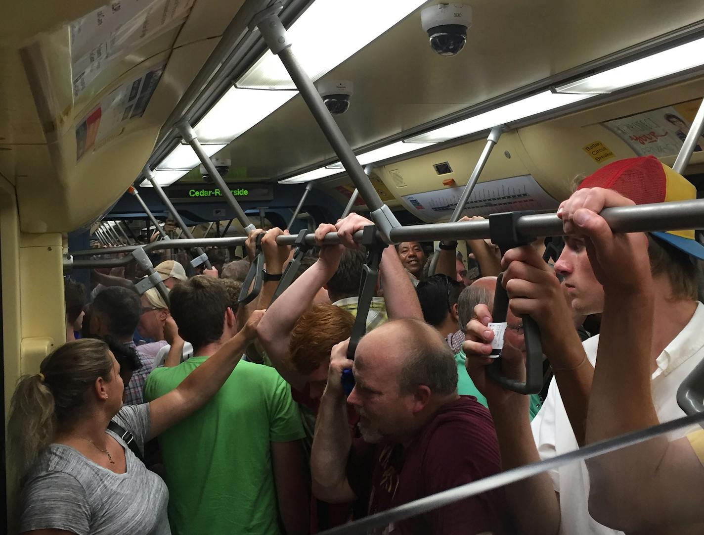 Passengers packed into Blue Line trains southbound after the first event at U.S. Bank Stadium in downtown Minneapolis on Wednesday, Aug. 3, 2016.