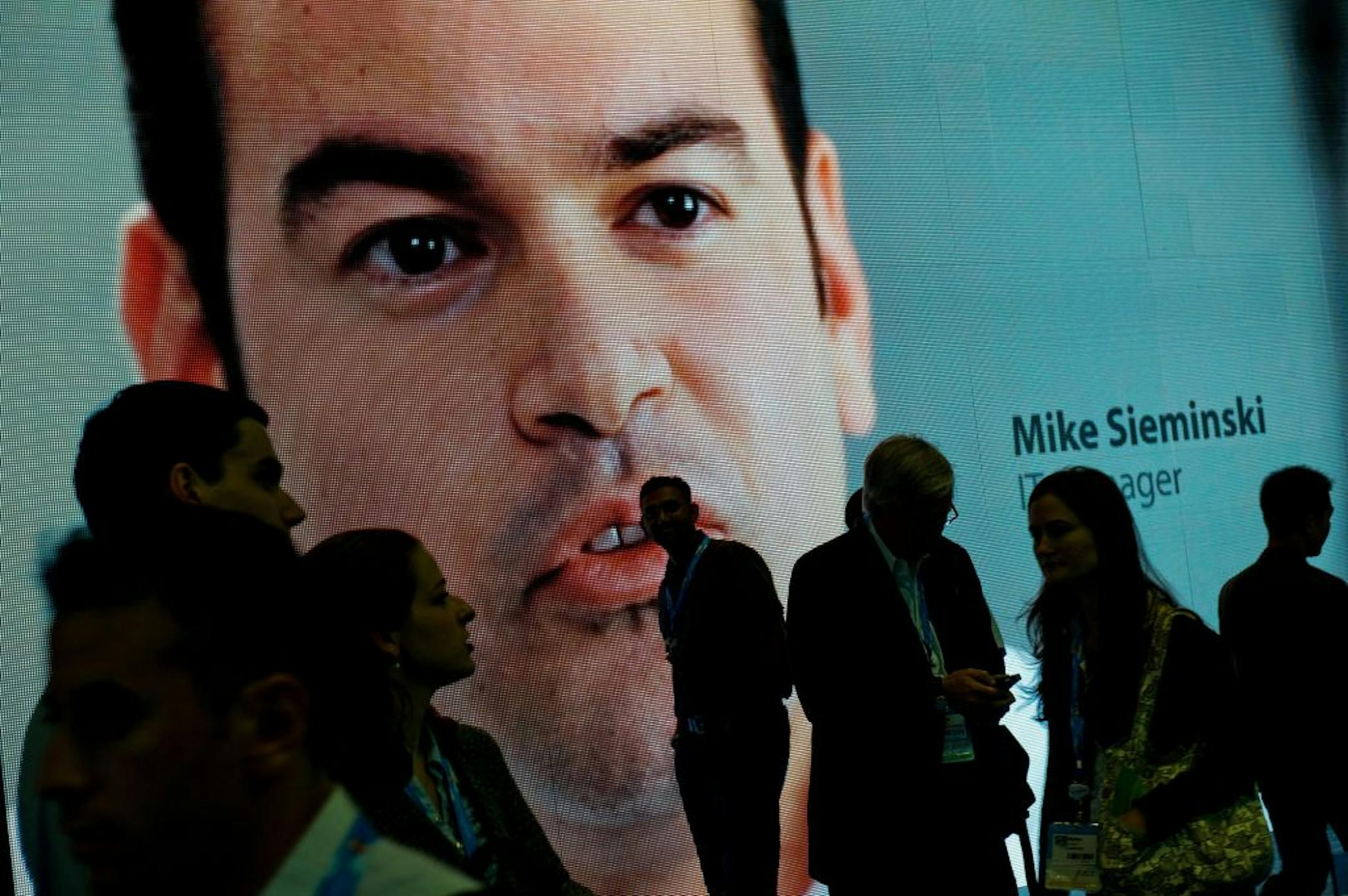 Attendees are seen in the Cloud Expo room during the DreamForce 2011 conference in San Francisco, California, U.S., on Wednesday, Aug. 31, 2011. The DreamForce conference, in its ninth year, brings together leaders in cloud computing for breakout sessions, training and networking. Photographer: David Paul Morris/Bloomberg