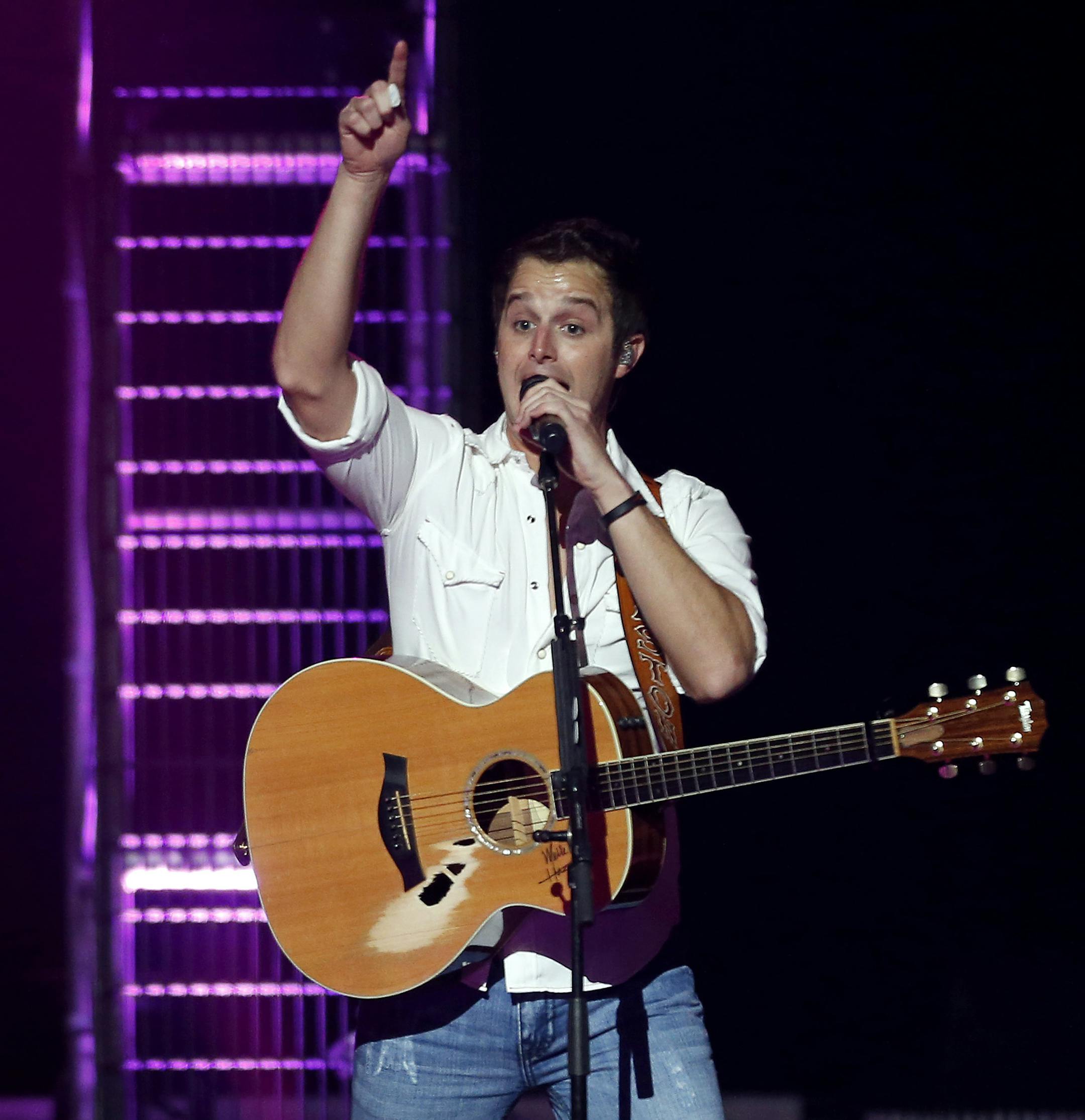 Easton Corbin performed at the Xcel Energy Center on Thursday night. Kramer was one of the opening acts for Blake Shelton. ] CARLOS GONZALEZ cgonzalez@startribune.com September 12, 2013, St. Paul, Minn., Xcel Energy Center, country star and The Voice coach Blake Shelton concert Opening acts - Jana Kramer, Easton Corbin,
