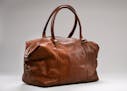 ] AARON LAVINSKY &#xef; aaron.lavinsky@startribune.com Minnesota-made leather goods add style and durability to your travel necessities. Photographed 