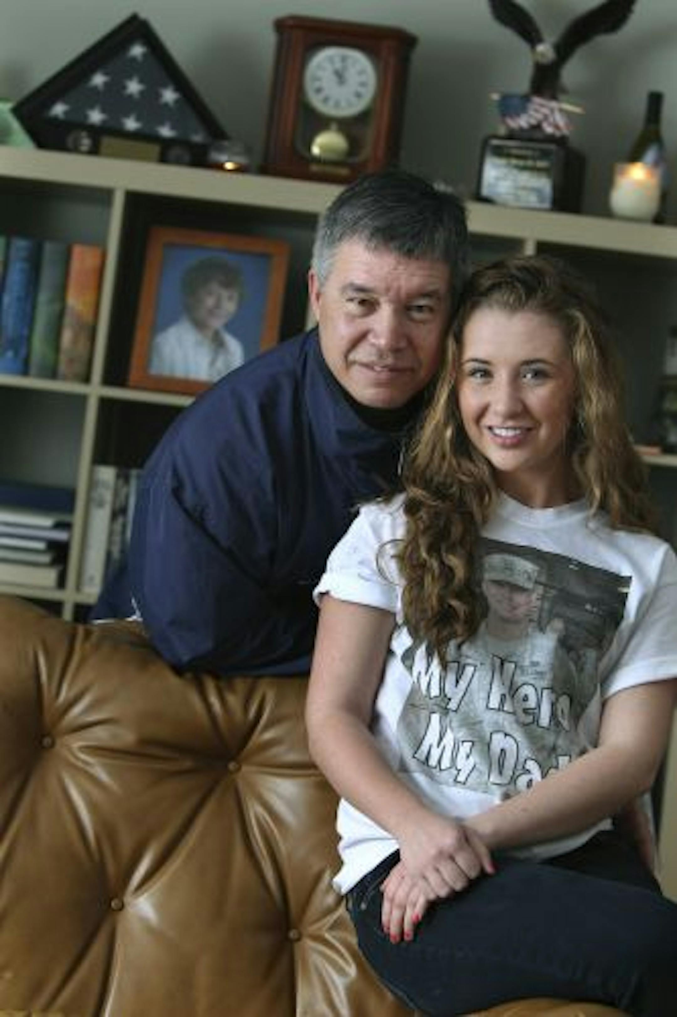 Kiana Kelii, shown with her father, Bruce, meets with teens from military families from across the state.