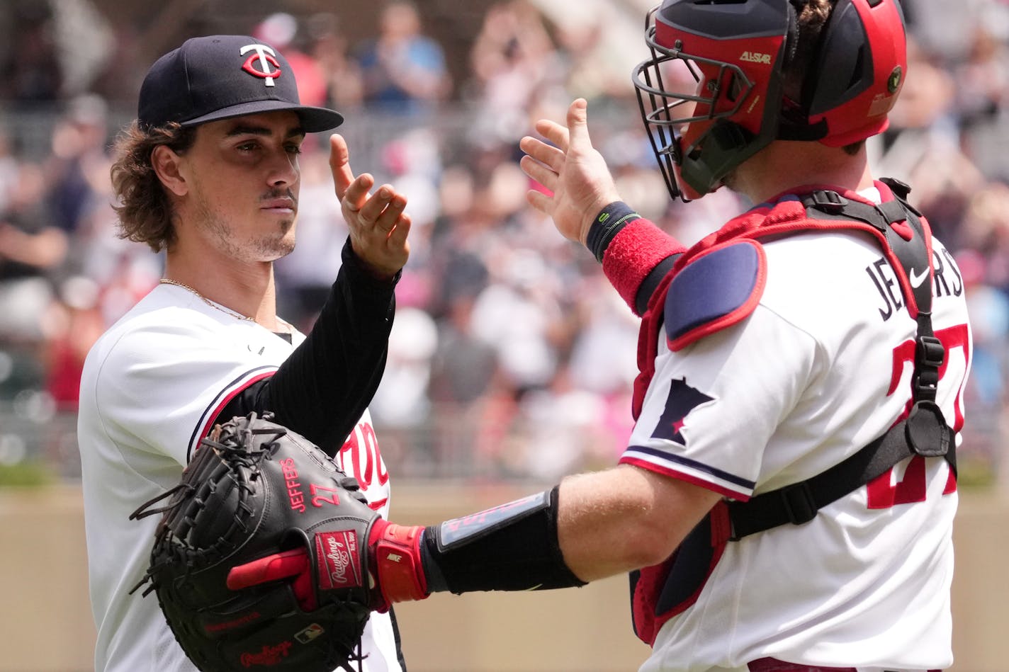 Minnesota Twins starting pitcher Joe Ryan (41) celebrates the win with catcher Ryan Jeffers (27) at the end of the ninth inning of an MLB game between the Minnesota Twins and the Boston Red Sox Thursday, June 22, 2023 at Target Field in Minneapolis. ] ANTHONY SOUFFLE • anthony.souffle@startribune.com