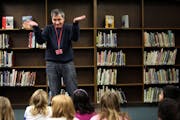 Artist Steve Busa worked with fourth-grade students just before they started on a focusing exercise at Lake Nokomis Community School.