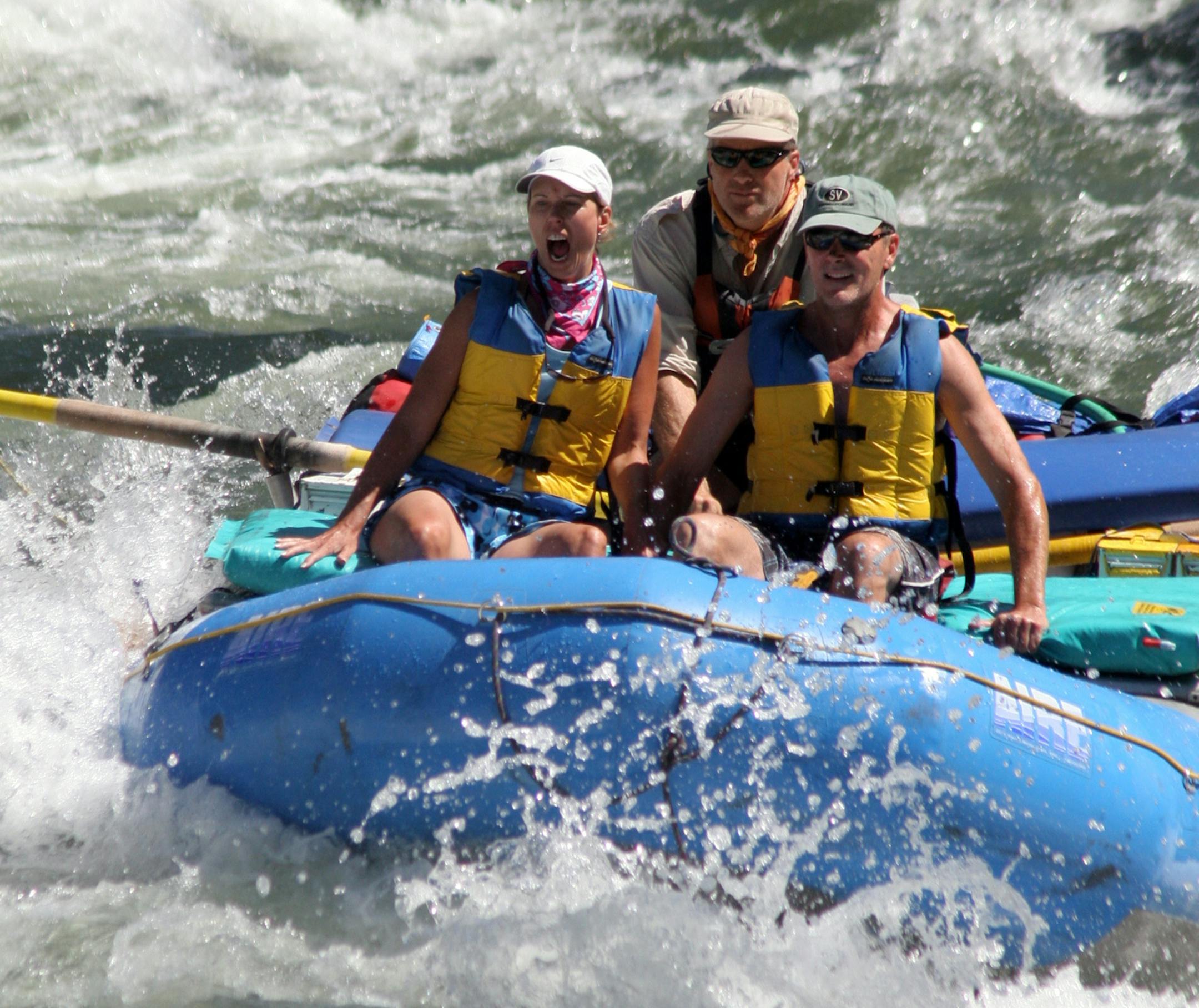 A couple prepared to hit the rapids at the front of a raft on the Salmon River. ] Jim Umhoefer, special to the star tribune
