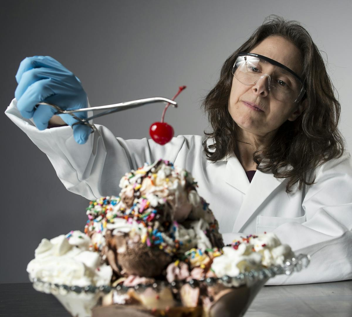 Traci Mann is photographed maker a large ice cream sundae in the Star Tribune studio on Tuesday, March 17, 2015. ] (Aaron Lavinsky | StarTribune) Prof