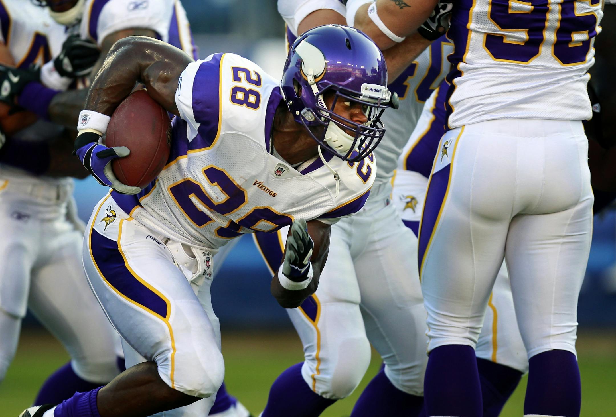 Minnesota Vikings running back Adrian Peterson (28) took a handoff during pre game warm-ups.