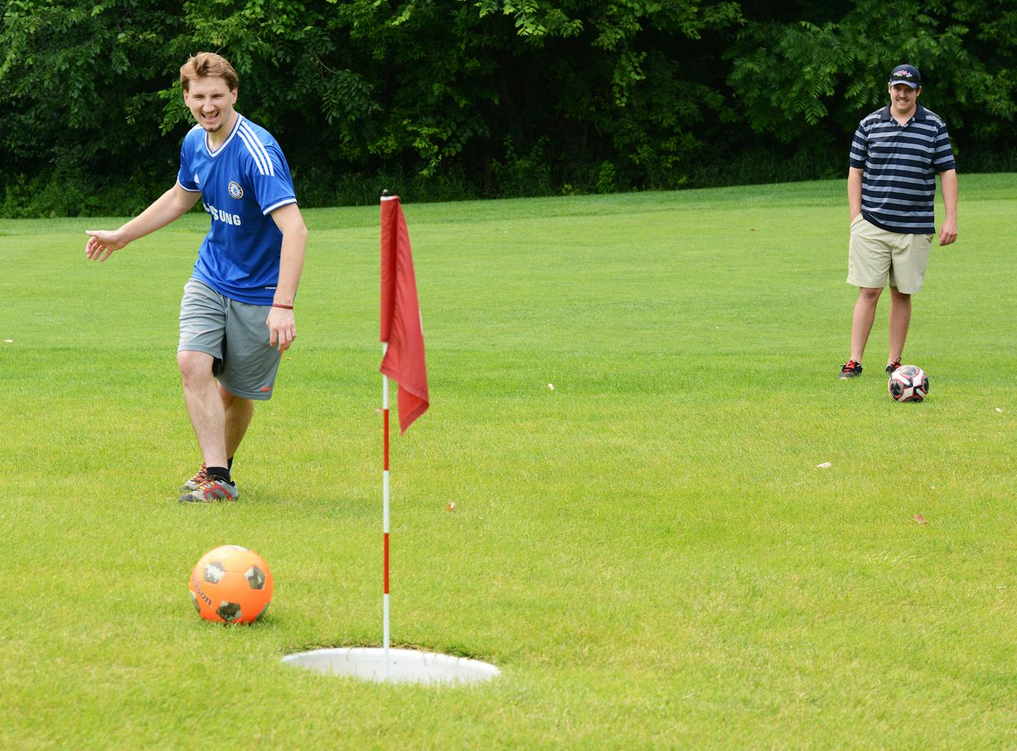 In a round of footgolf at Inver Wood Golf Course in Inver Grove Heights, Elliott Gonsioroski kicked the ball just shy of the cup as Sam Nord watched.