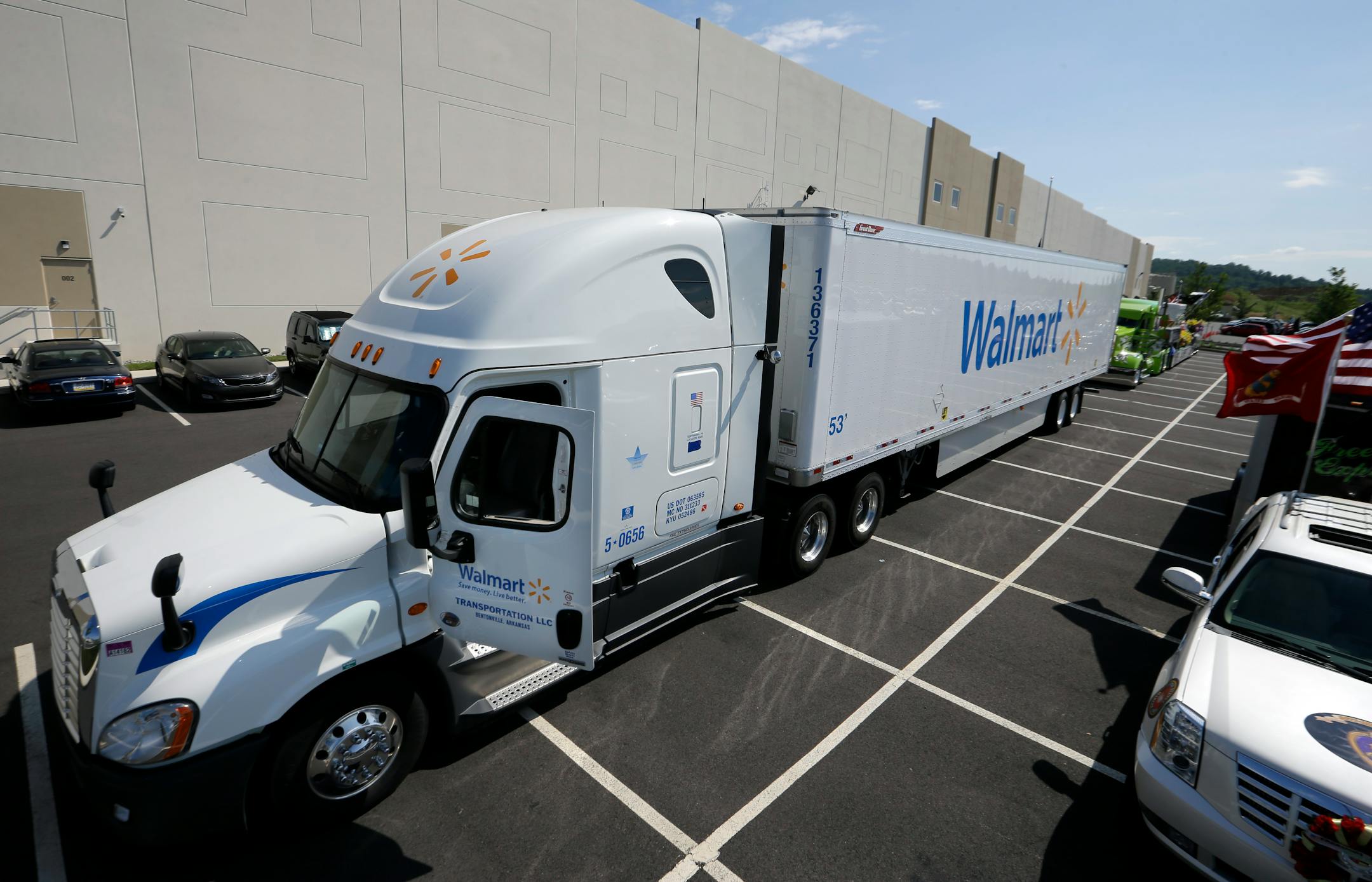 A Wal-mart truck is parked in front at a new distribution facility in Bethlehem, Pa., Wednesday, July 22, 2015. Wal-mart and local officials gathered for a preview of the new facility. (AP Photo/Mel Evans)