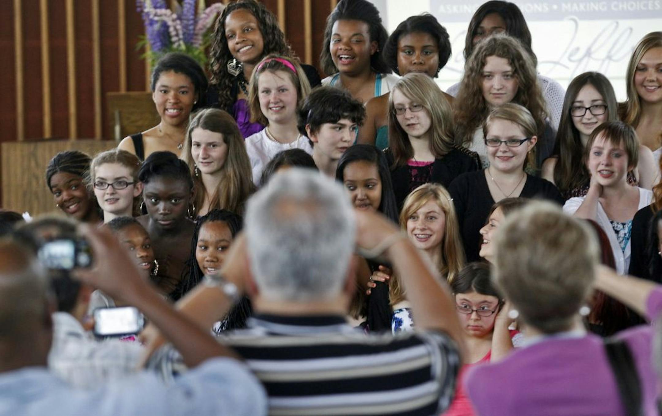 Laura Jeffrey Academy. Minnesota's first all-girl charter school held graduation ceremonies for its first ever class of 8th graders. The ceremony was held at Weyerhauser Chapel on the campus of Macalester College in St. Paul on Wednesday June 29, 2011. Graduating 8th graders posed for photographs by family members at the end of graduation exercises.