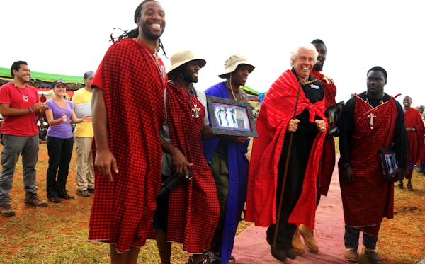 The first one is NFL players in Tanzania, featuring Larry Fitzgerald Jr. (left), Starkey's Bill Austin (the white dude) and NFL players (from left aft