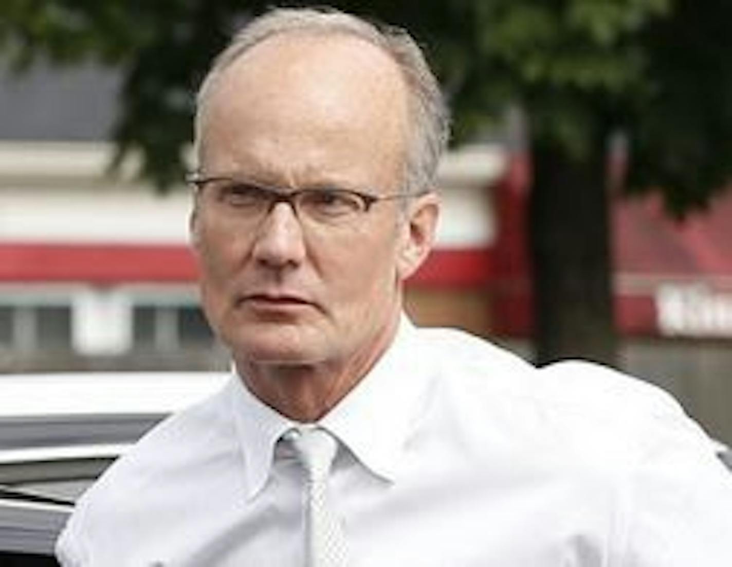 In this Sept. 8, 2015, photo, dentist Walter Palmer, arrived back at his office in Bloomington amid intense news media coverage.