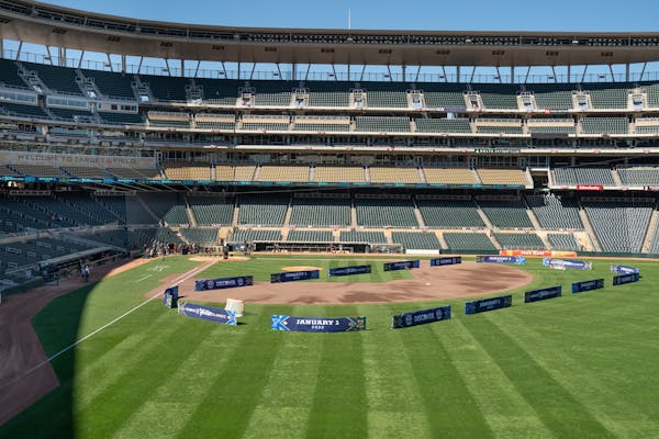 Fences show how the hockey rink will be set at Target Field for the Winter Classic.