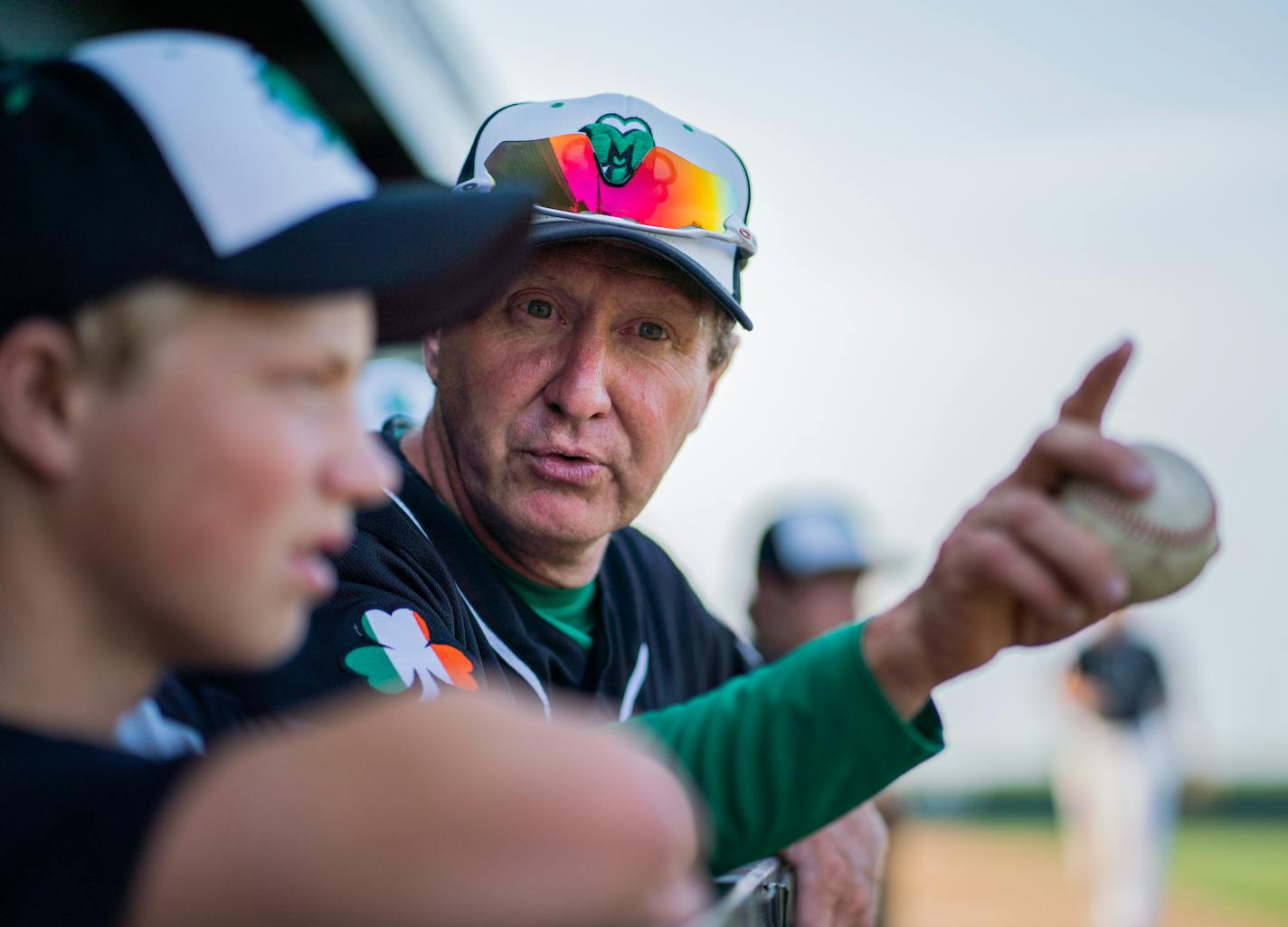 Irish manager Bob Dolan watched his team against Bird Island from the dugout.