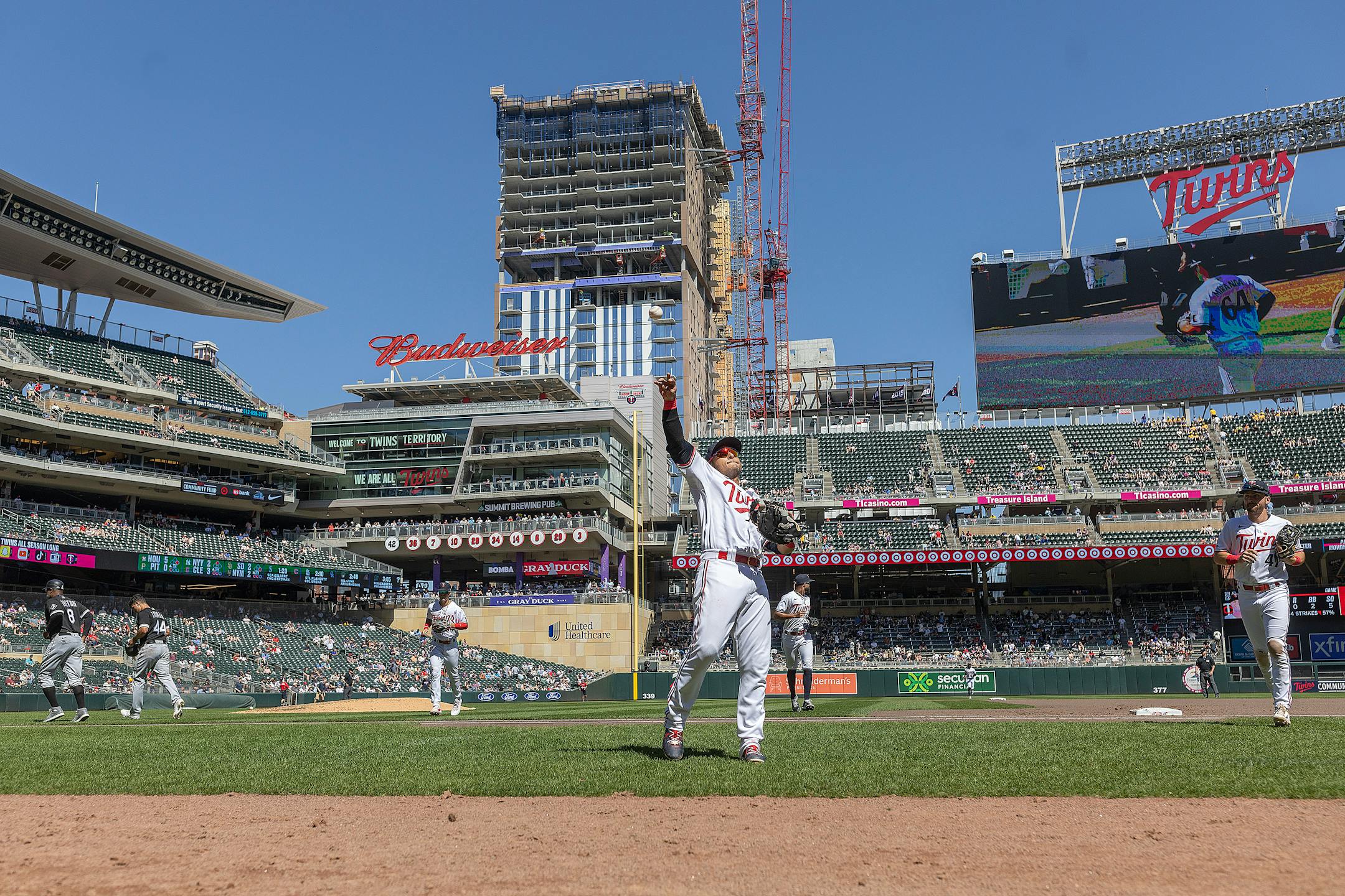 Minnesota Twins second baseman Donovan Solano (39) throws the ball into the stands after the top of the seventh inning as the Minnesota Twins take on the Chicago White Sox at Target Field in Minneapolis, Minn., on Wednesday, April 12, 2023. ] Elizabeth Flores • liz.flores@startribune.com
