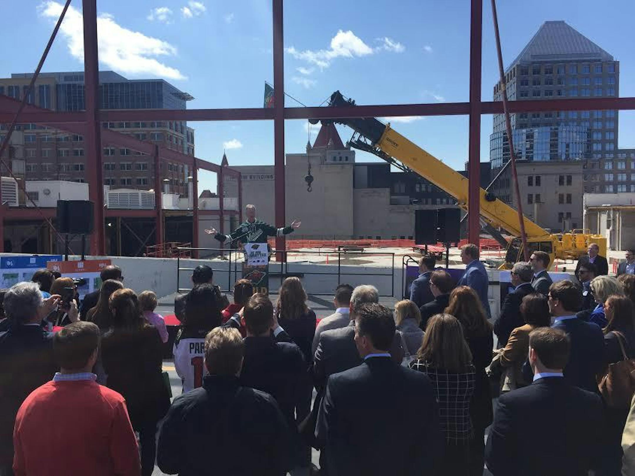 St. Paul Mayor Chris Coleman celebrates the redevelopment of Treasure Island Center, which will have a rooftop Wild training rink, in downtown St. Paul.