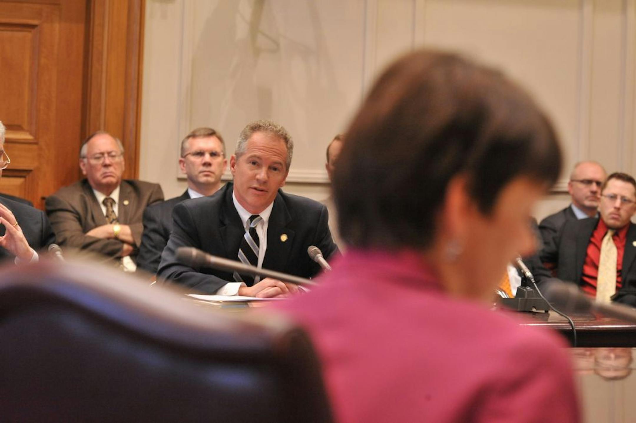 Sen. Geoff Michel listens during a Minnesota Senate committee meeting, Friday.