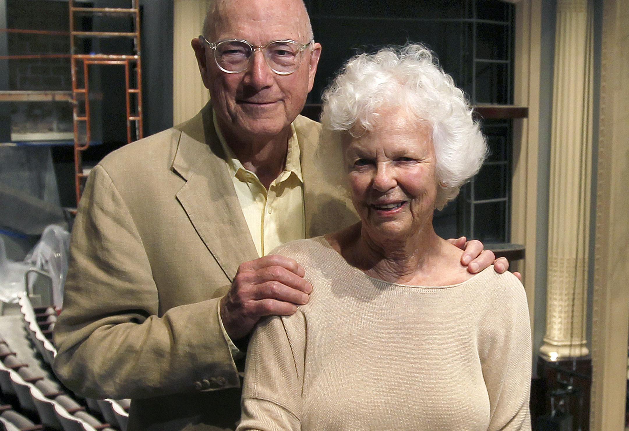 In this Aug. 25, 2011, photo, John Cowles Jr. and Sage Cowles pose for a photo at the Minnesota Shubert Center in Minneapolis. Cowles, a former publisher and chairman of the Star Tribune newspapers and a philanthropist who helped shape the cultural community of the Twin Cities by pushing for facilities like the Guthrie Theater and the Metrodome, has died. He was 82. (AP Photo/The Star Tribune, Tom Wallace) MANDATORY CREDIT; ST. PAUL PIONEER PRESS OUT; MAGS OUT; TWIN CITIES TV OUT ORG XMIT: MIN20