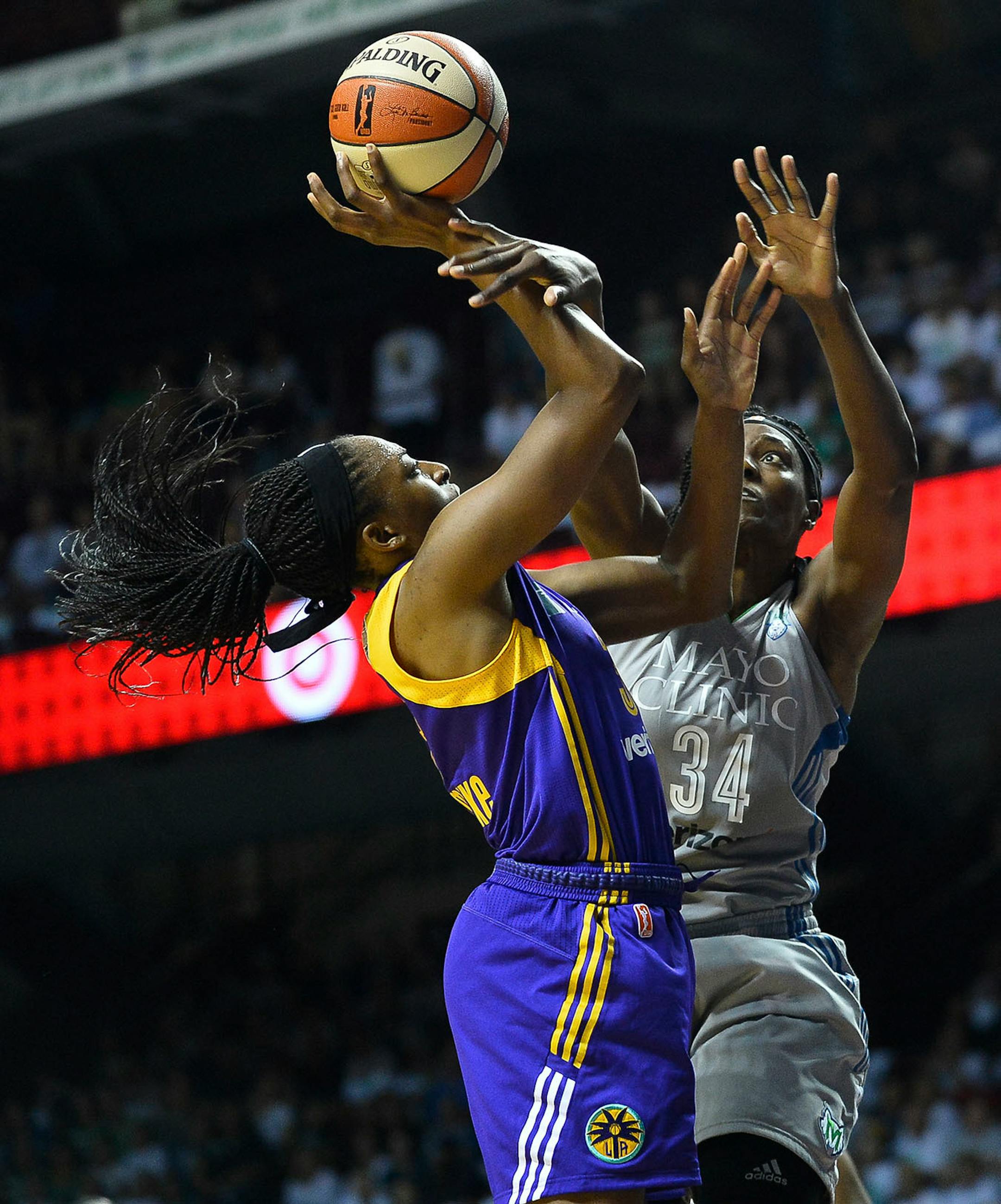 Minnesota Lynx center Sylvia Fowles (34) blocked a shot by Los Angeles Sparks forward Nneka Ogwumike (30) in the first half.