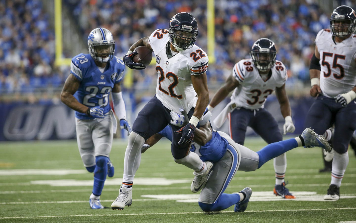 Detroit Lions outside linebacker Josh Bynes (57) tackles Chicago Bears running back Matt Forte (22) during the second half at Ford Field Sunday, Oct. 18, 2015, in Detroit, Mich. The Lions won 37-34 in overtime. (Armando L. Sanchez/Chicago Tribune/TNS) ORG XMIT: 1175347