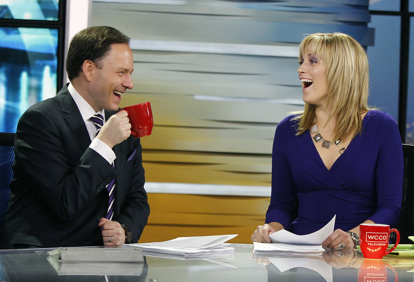 WCCO's morning show anchors Jason DeRusha and Jamie Yuccas shared a laugh before going on live, Tuesday, March 11, 2014 in Minneapolis, MN. "CBS This Morning" is no. 1 in this market and the WCCO morning team is up 18 percent from last year. ] (ELIZABETH FLORES/STAR TRIBUNE) ELIZABETH FLORES &#xa5; eflores@startribune.com