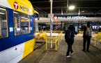 Passengers walked from the light rail platform to the Mall of America at its updated transit station Friday.