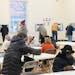Voters fill out their ballots on Nov. 8 at Emerson Dual Language School in Minneapolis.
