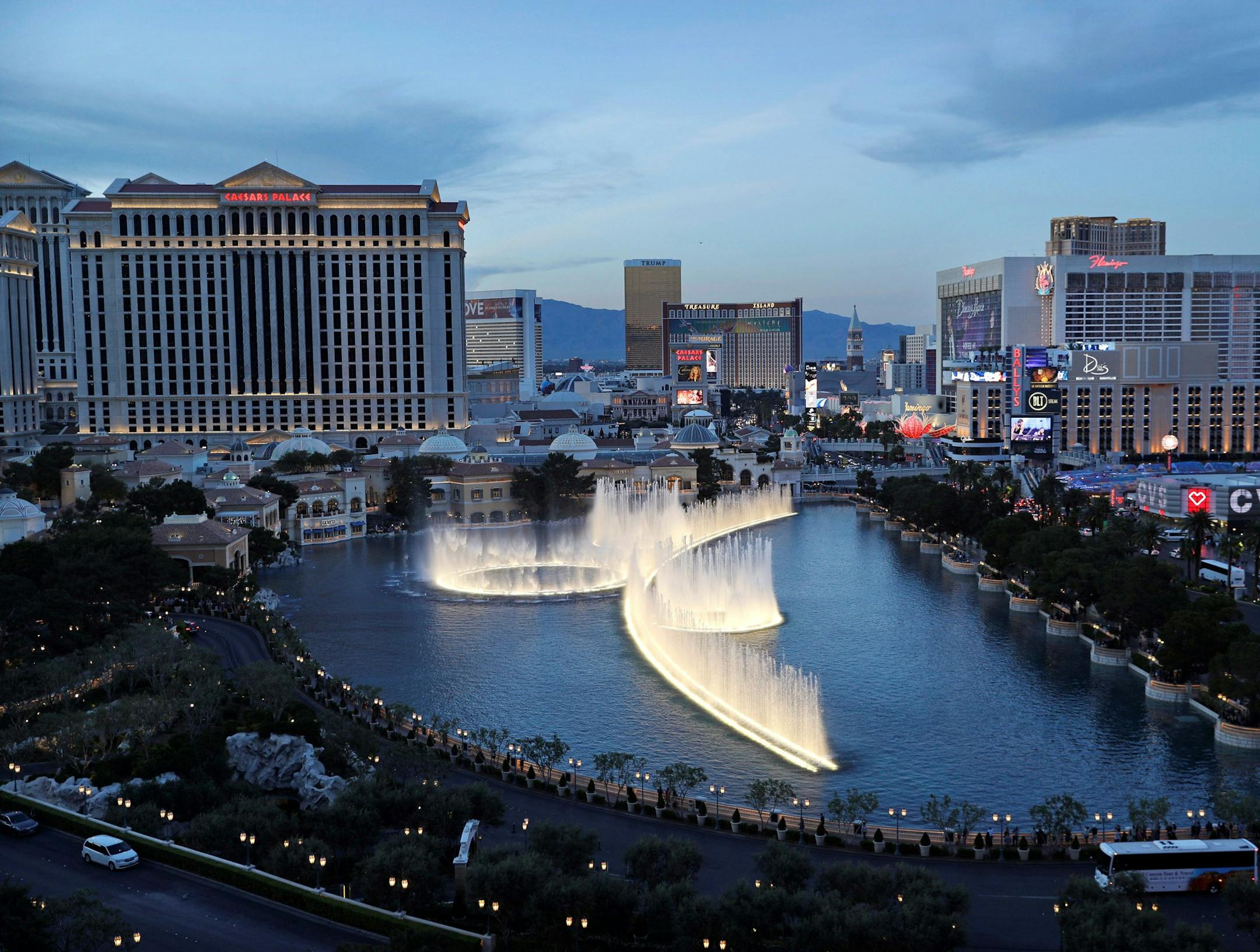 File - In this April 4, 2017, file photo, the fountains of Bellagio erupt along the Las Vegas Strip in Las Vegas. State regulators say gambling revenue at Nevada casinos was up almost 1.2 percent in April compared with the same month a year ago. (AP Photo/John Locher, File) ORG XMIT: NVJL101
