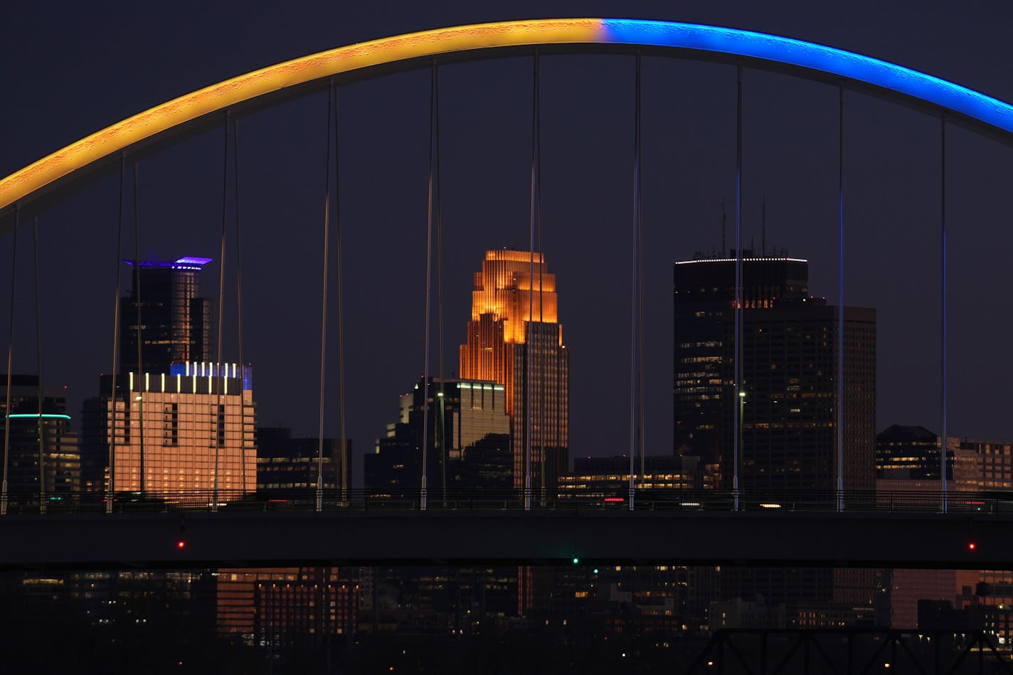 The Lowry Avenue bridge in Minneapolis was lit up Friday with blue and yellow, the colors of the Ukrainian flag, as a show of support their people after the country was invaded by Russian military forces.