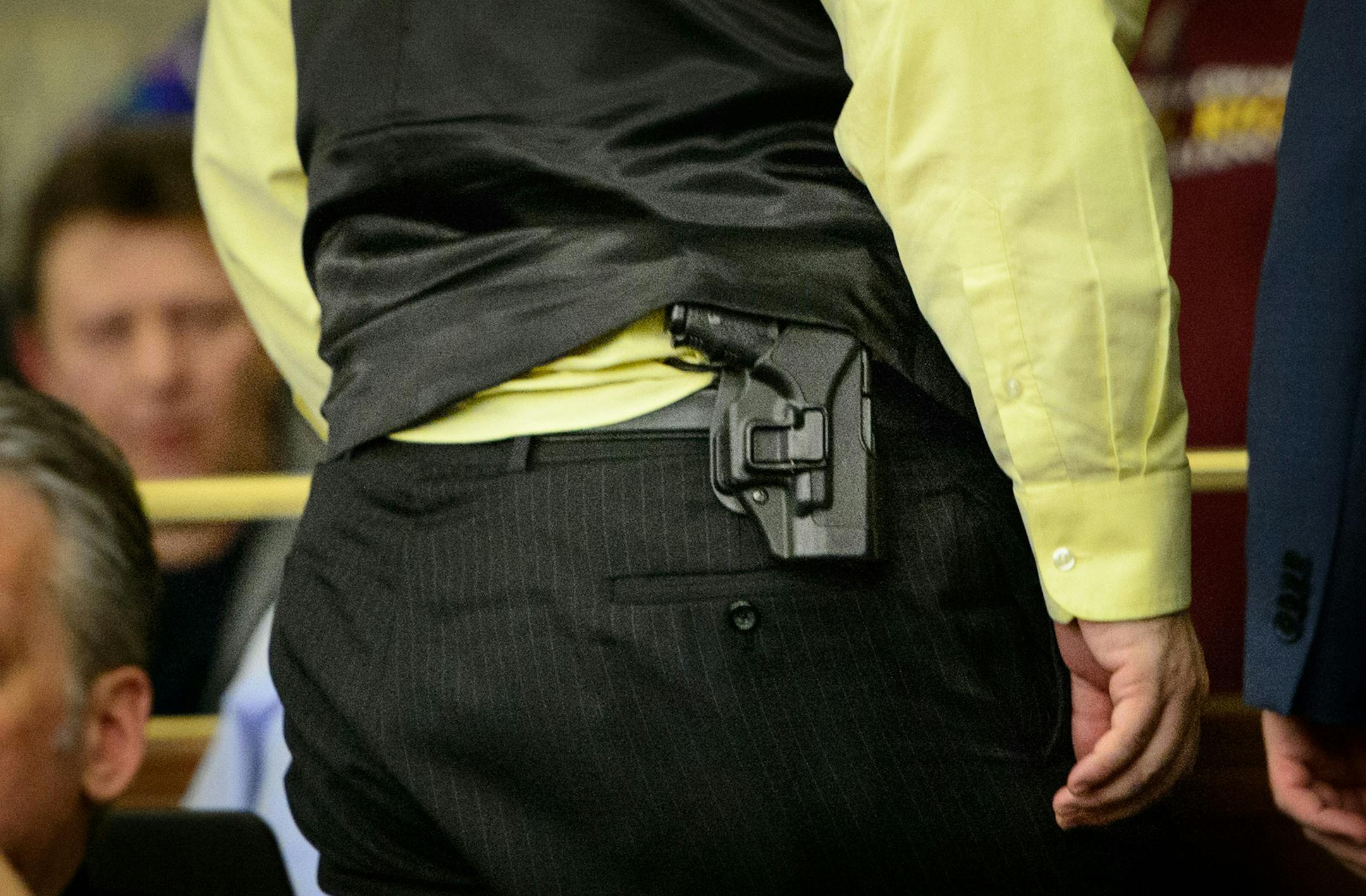 Rep Dan Schoen, DFL-Cottage Grove, is a Cottage Grove police officer and regularly wears his service weapon to the Capitol. He is on the House Public Safety committee which heard a bill Thursday that would allow suppressors or silencers on guns in Minnesota. ] GLEN STUBBE * gstubbe@startribune.com Thursday, March 12, 2015