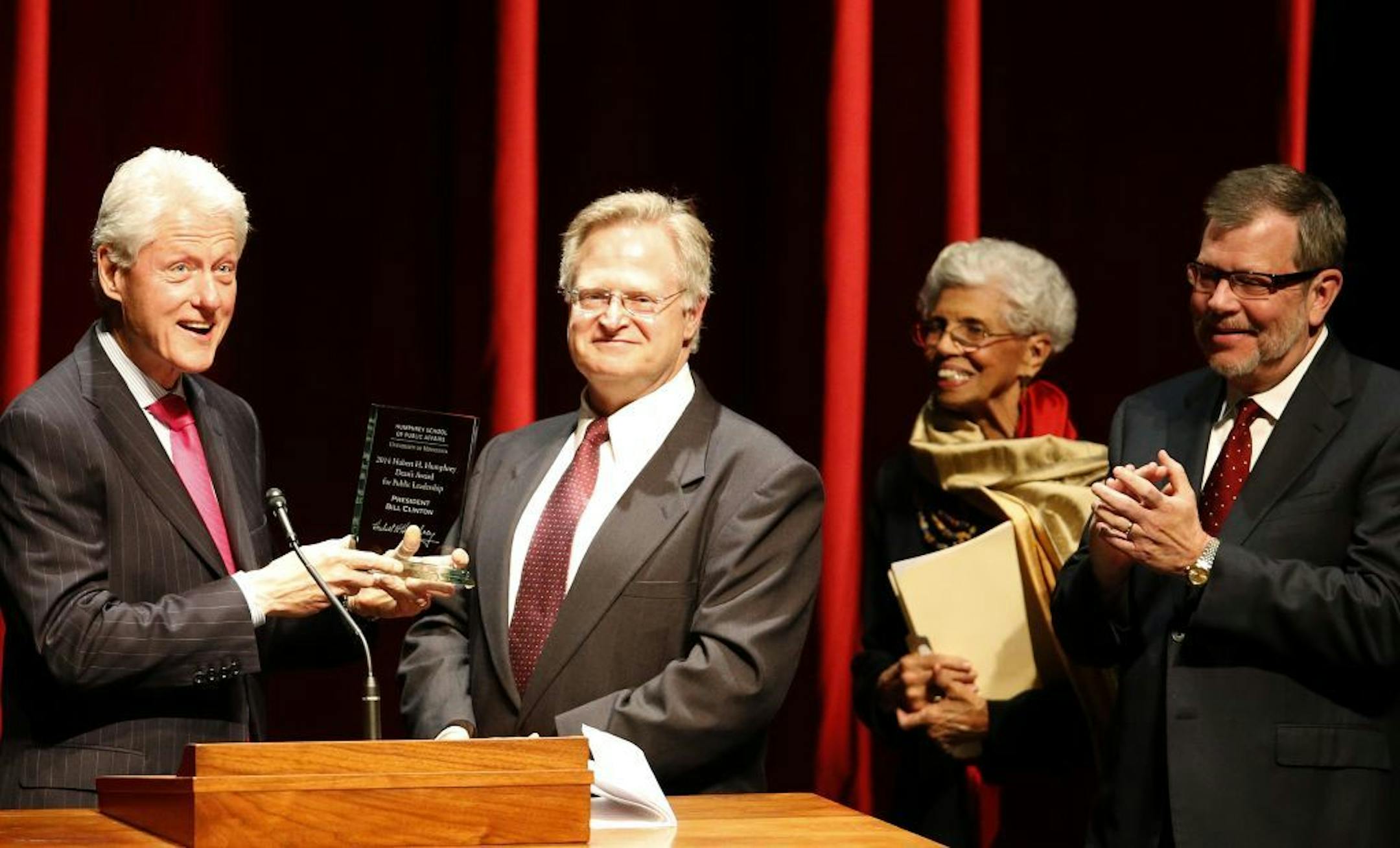 President Bill Clinton was presented with the Dean Award for Public Leadership by Eric Schwartz, dean of the Hubert H. Humphrey School of Public Affairs at Northrop Auditorium at the University of Minnesota.