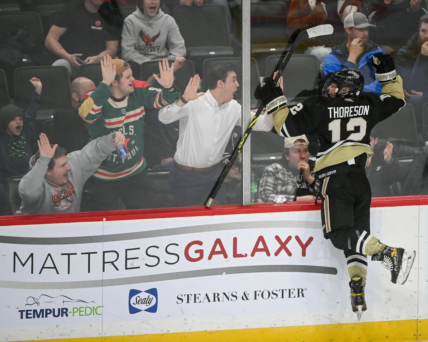 Andover forward Gavyn Thoreson (12) celebrates his empty-netter against Hill-Murray in the third period during a Class 2A State Tournament semifinal game Friday, March 11, 2022 at the Xcel Energy Center in St. Paul, Minn. ] AARON LAVINSKY • aaron.lavinsky@startribune.com