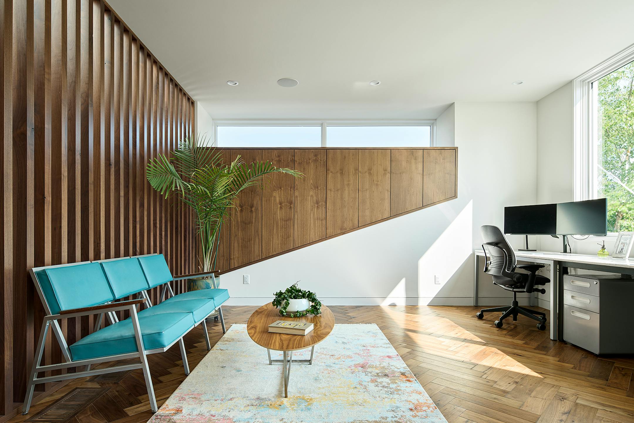 After a fire forced a remodel of a St. Louis Park home, a family hoped for a footprint similar to their original single-story ranch-style house. At the same time, they were game for introducing new, bold and unique materials and design features such as soaring rooflines and transom windows that allow light to come in and display the family's vast plant collection like never before.