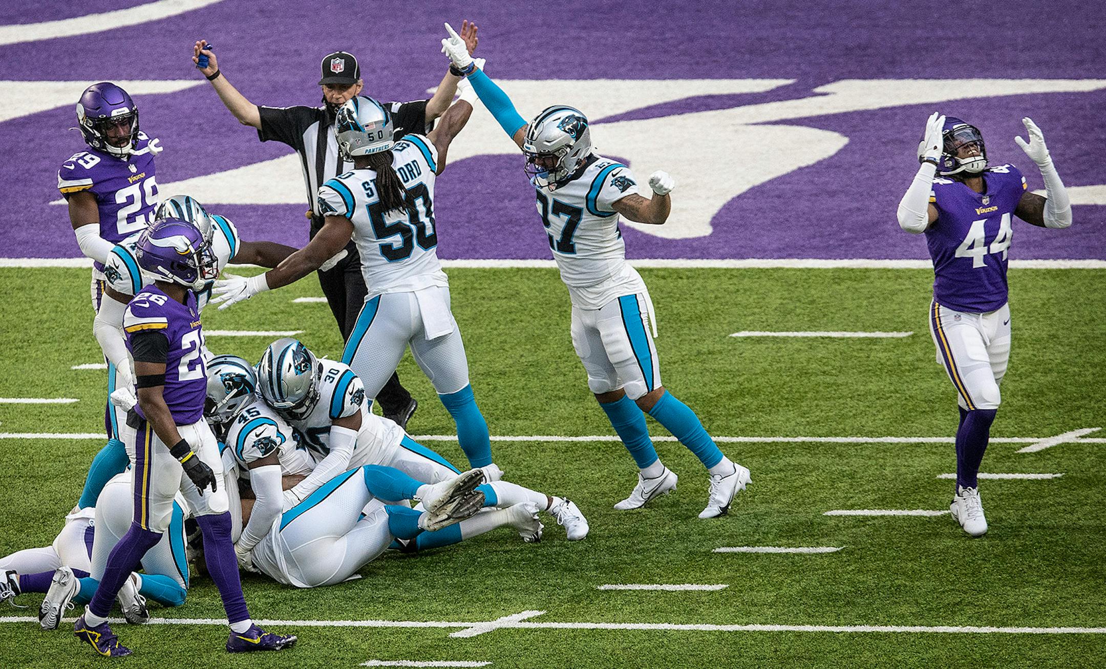 Minnesota Vikings safety Josh Metellus (44) right, reacted after Carolina recover a fumble by Minnesota Vikings wide receiver Chad Beebe (12) late in the fourth quarter.