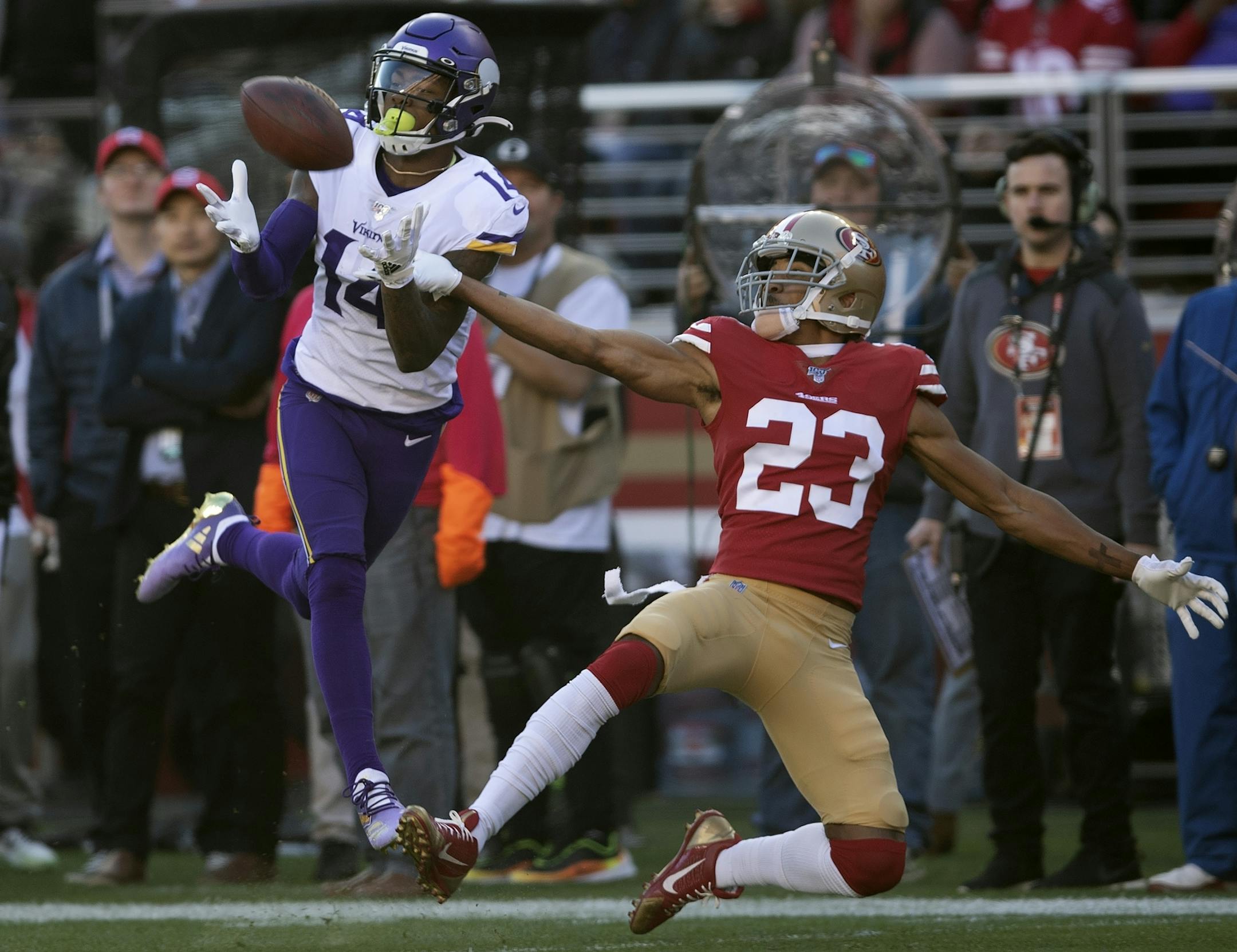 Minnesota Vikings wide receiver Stefon Diggs (14) caught a pass over San Francisco 49ers cornerback Ahkello Witherspoon (23) and scored in the first quarter.