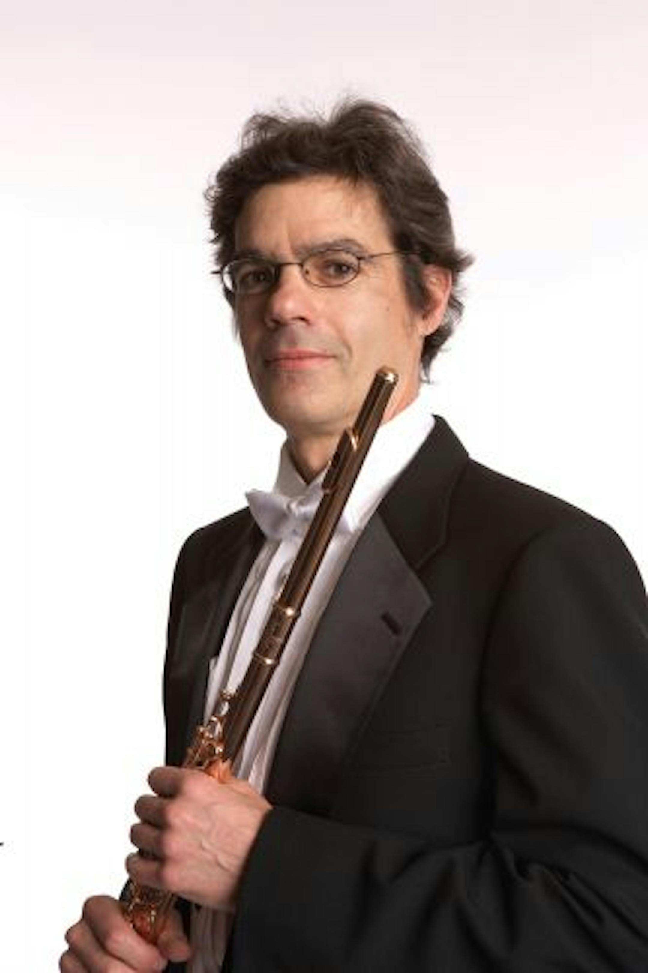 Adam Kuenzel, principal flute of the Minnesota Orchestra, performed a new flute concerto by Manuel Sosa.
