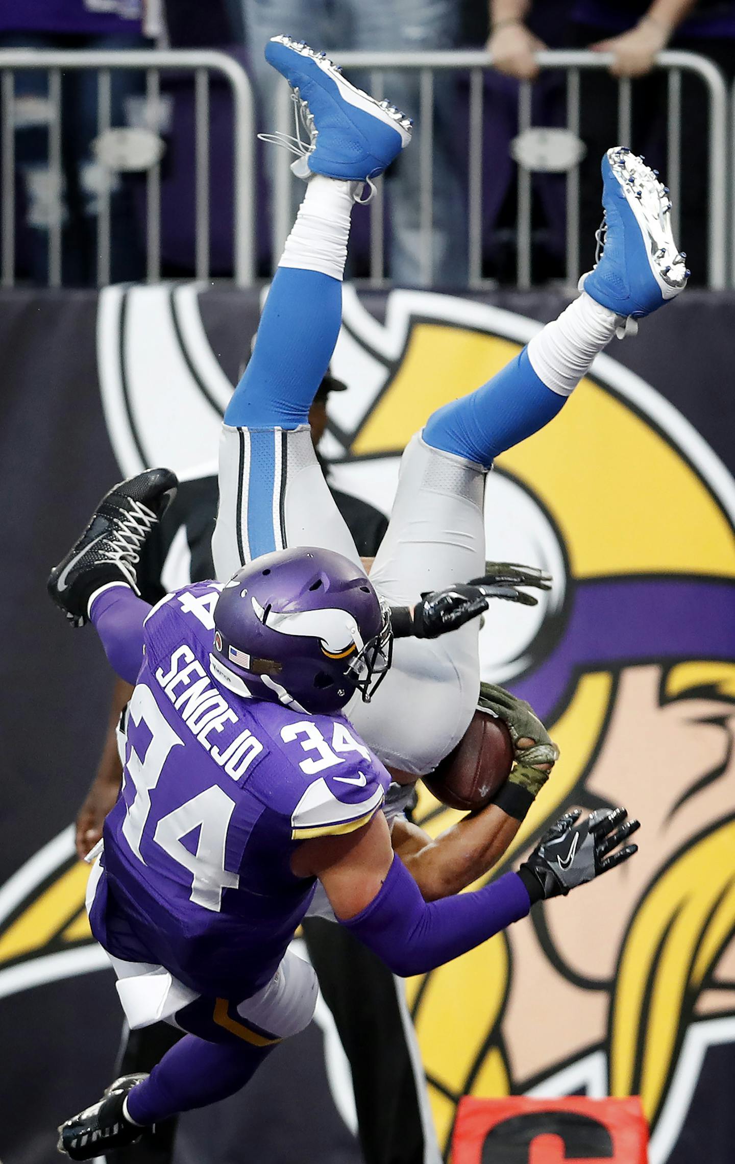 Andrew Sendejo (34) hit Golden Tate (15) as he leapt into the end zone to score the winning touchdown in overtime. Detroit beat Minnesota by a final score of 22-16. ] CARLOS GONZALEZ cgonzalez@startribune.com - November 6, 2016, Minneapolis, MN, US Bank Stadium, NFL, Minnesota Vikings vs. Detroit Lions