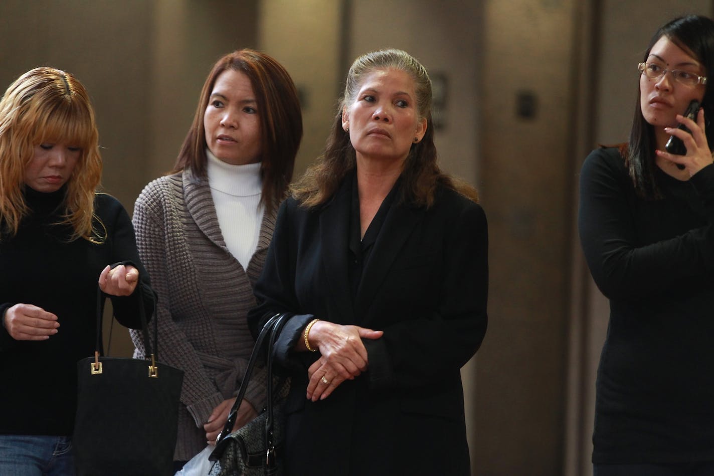 The family of victim Anousone Phanthavong arrived at the Hennepin County Government center for the sixth day of Amy Senser's trial Monday.