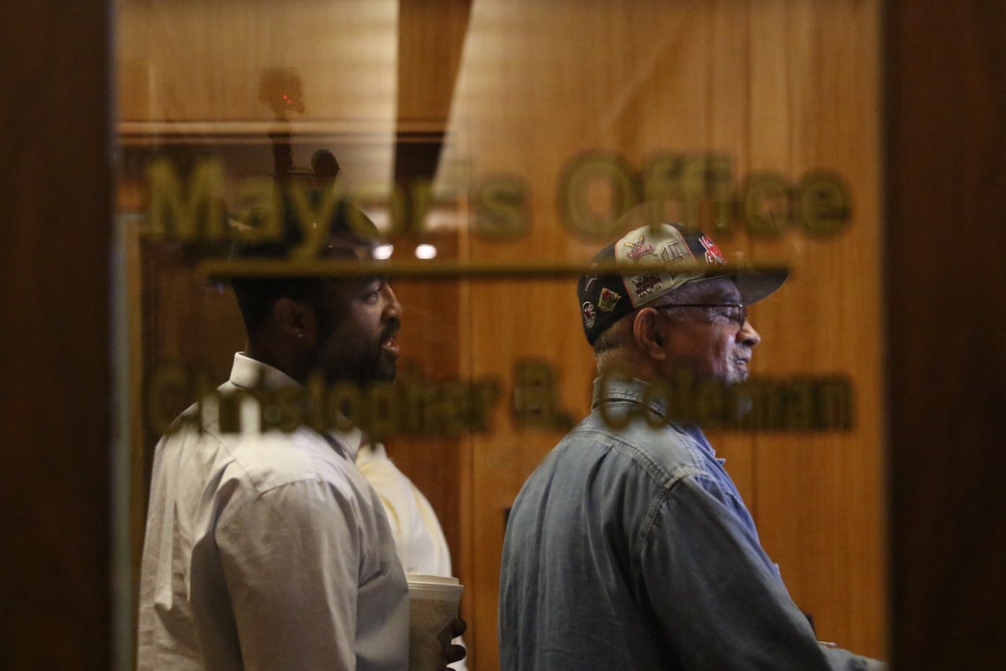 Rashad Turner, left, the leader of the St. Paul Black Lives Matter group meets Thursday in the office of St. Paul Mayor Chris Coleman.