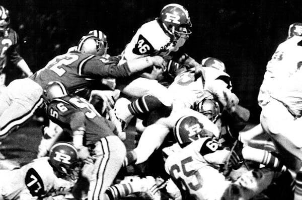 Rochester John Marshall’s Kent Kitzmann tore through the Bloomington Jefferson line — 40 times, in fact — and rushed for 195 yards in the 1974 C