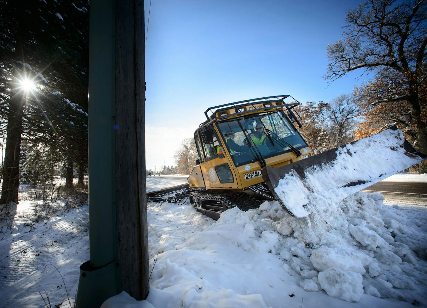 Club president Bill Prinsen, left, operated the drag, flattening the snow as John Bautch piloted the tractor along Lake Drive NE in Lino Lakes. The Rice Creek Trail Association grooms more than 70 miles of trails in the Circle Pines/Lino Lakes area. Thursday, December 12, 2013 ] GLEN STUBBE * gstubbe@startribune.com