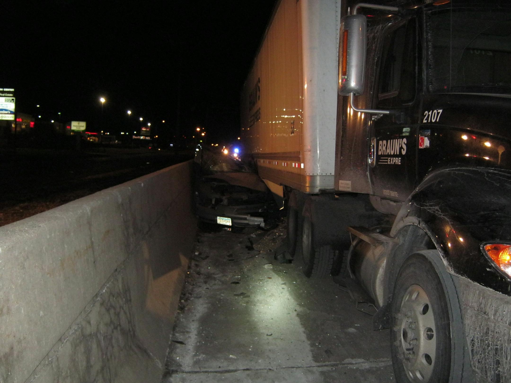 A semitrailer truck was parked on the shoulder of I-94 westbound in Wisconsin on Friday when a 2000 Oldsmobile Intrigue crashed into it, killing a 22-year-old Woodbury man.