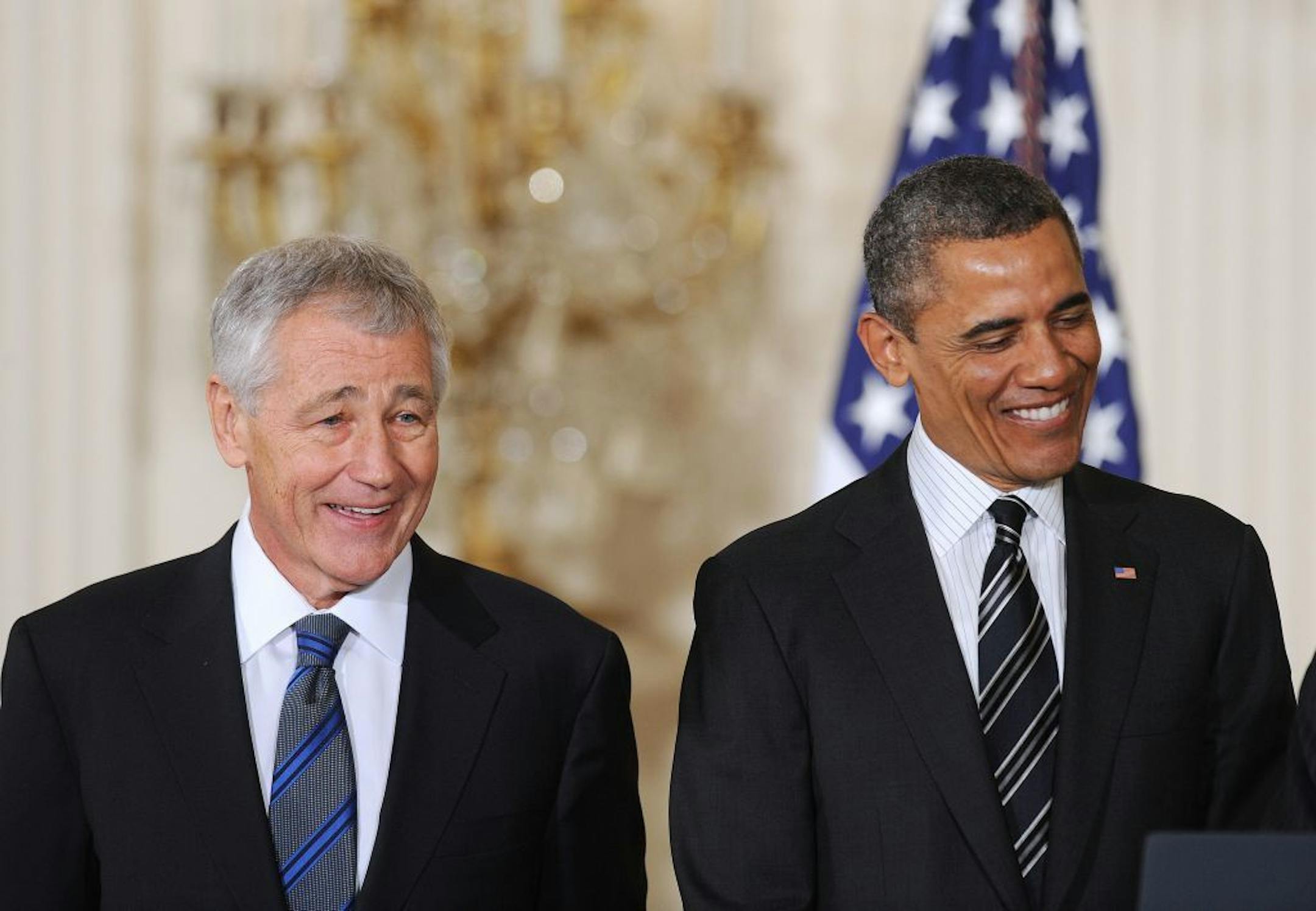Former U.S. Senator Chuck Hagel, left, a Republican from Nebraska, is nominated to be Secretary of Defense by President Barack Obama at the White House on Monday, January 7, 2013, in Washington, DC.