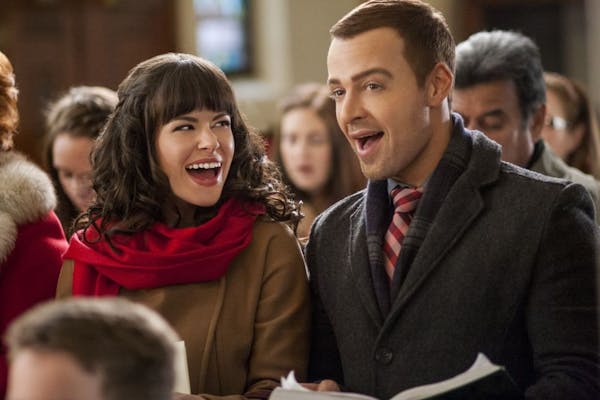 Emily Hampshire and Joey Lawrence in "Hitched for the Holidays" on the Hallmark Channel.