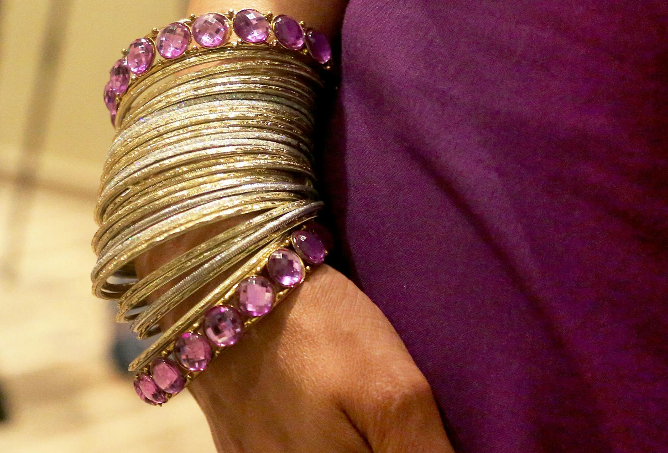 JW Marriott at the Mall of America held a cultural training for employees that focused mostly on Indian Weddings where the average cost in the U.S. is $250,000. In the Indian tradition, Seema Jain, multicultural affairs director for Marriott and also Indian, wears a wrist full of bracelets, also known as bangles in India, while leading the training Thursday, May 26, 2016, at the JW Marriott at the Mall of America in Bloomington, MN.](DAVID JOLES/STARTRIBUNE)djoles@startribuneMarriott Internation